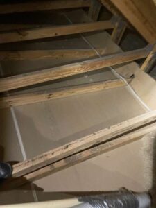 insulation removal in a customer's attic