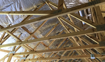 radiant barrier insulation in attic space of new construction